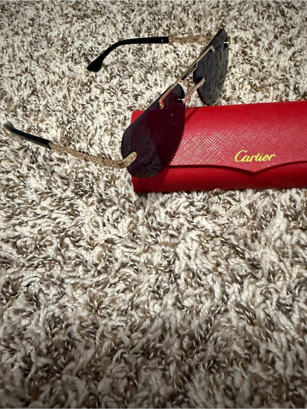 Cartier Gold Rimless Sunglasses with Black Temples
